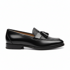 Black leather tassel loafers for men with basket weave texture detail and cushioned insole, side profile view