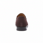 Back view of brown suede penny loafers displaying structured heel counter and quality stitching