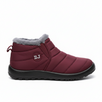 Burgundy waterproof quilted winter ankle boots with grey fur lining and slip-on design for women's cold weather wear