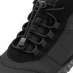 Close-up detail of waterproof quilted upper and quick-lace toggle system on men's barefoot winter boot