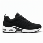 Men's black air cushion athletic sneakers with white sole and visible air cushion technology for arch support and comfort