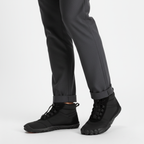 Black barefoot winter boots for men featuring wide toe box design and flexible zero-drop sole