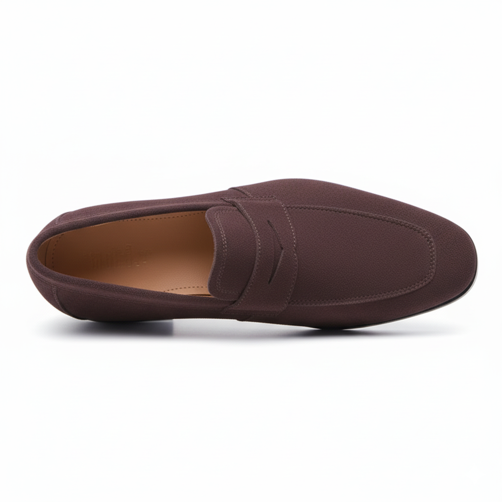Top view of men's brown suede penny loafers showing classic keeper strap and leather footbed