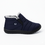 Navy insulated winter boots with elastic side panels and plush fur lining for easy slip-on convenience
