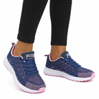 Navy blue and pink mesh running sneakers with white sole for women's athletic wear - Lewis Fordham UK