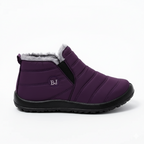 Purple insulated winter boots with elastic side panels and plush fur lining for easy slip-on convenience