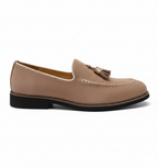Taupe suede tassel loafers for men with gold metallic detail and white piping, side profile view